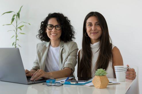 women working at a computer