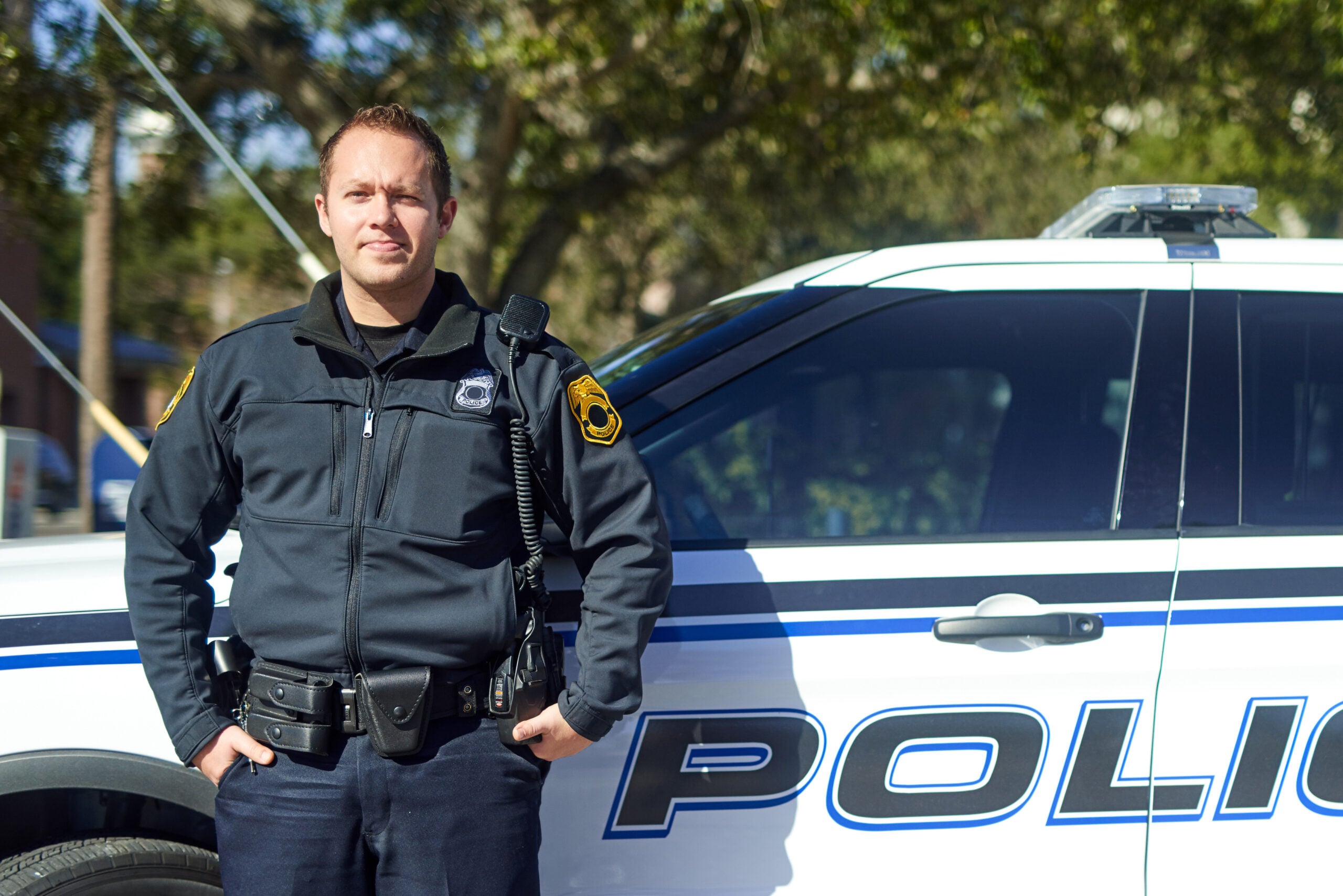 officer-you-can-trust-cropped-portrait-handsome-young-policeman-out-patrol